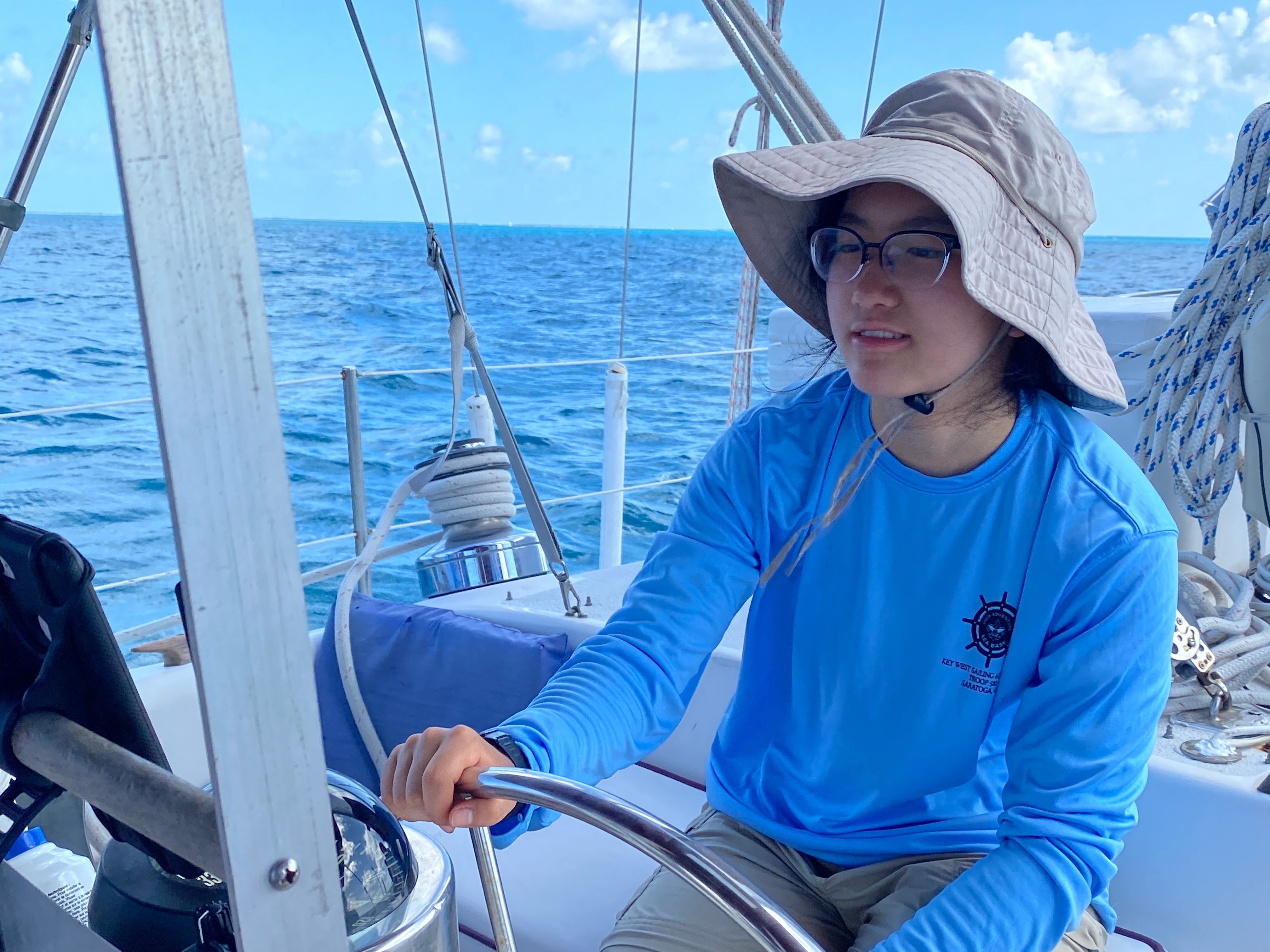 Laura piloting sailboat Seabase High Adventure